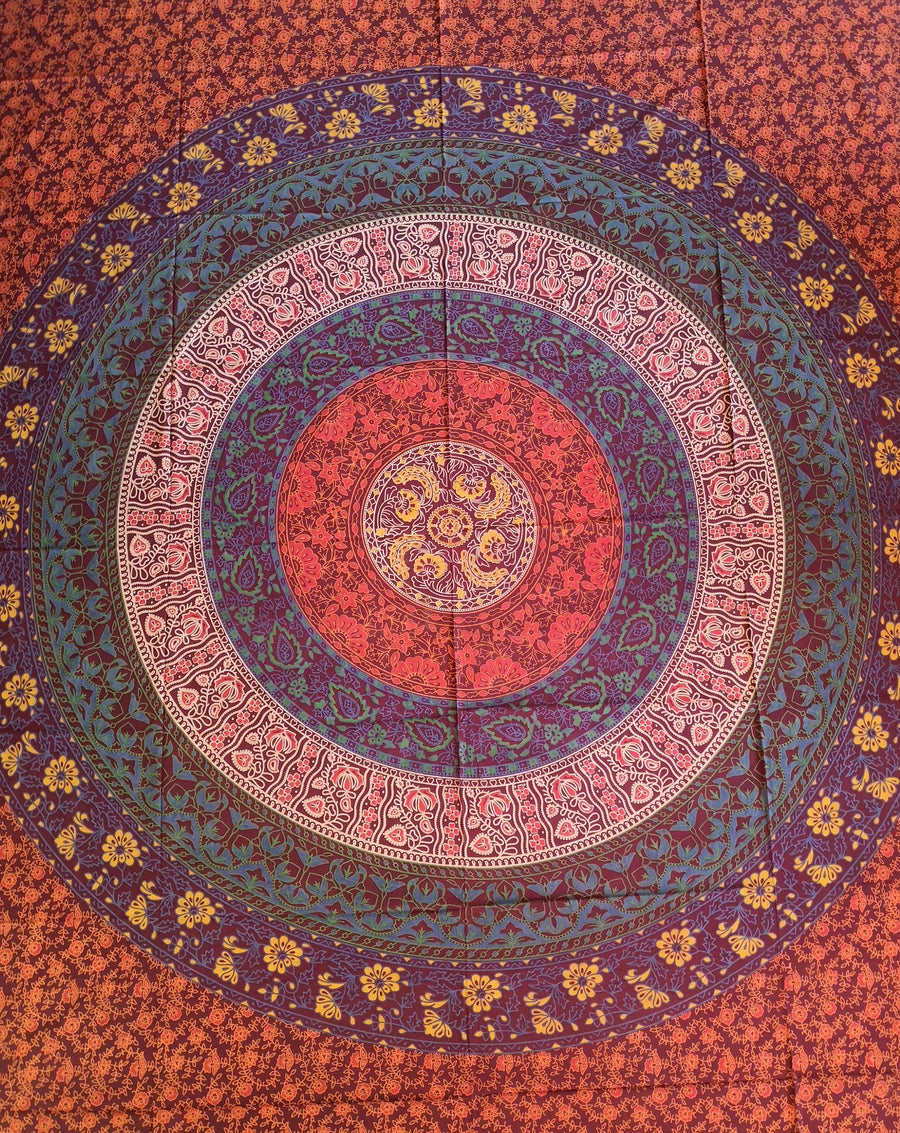 Magenta reds blues and turquoise circle with flowers indian tapestry