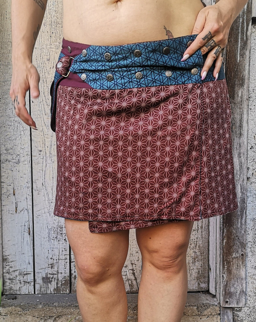 Ocean blue and burgundy skirt with Flower of Life pattern. Has pocket that unsnaps and can be put on other side of skirt.